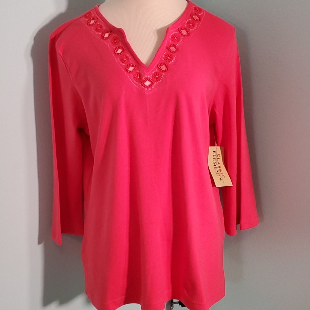 Classic elements ladies peach large top. NWT